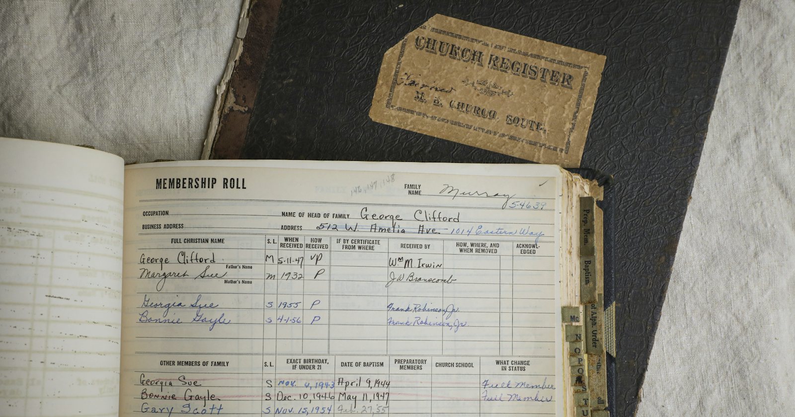 A printed sheet lying on a worn wooden board